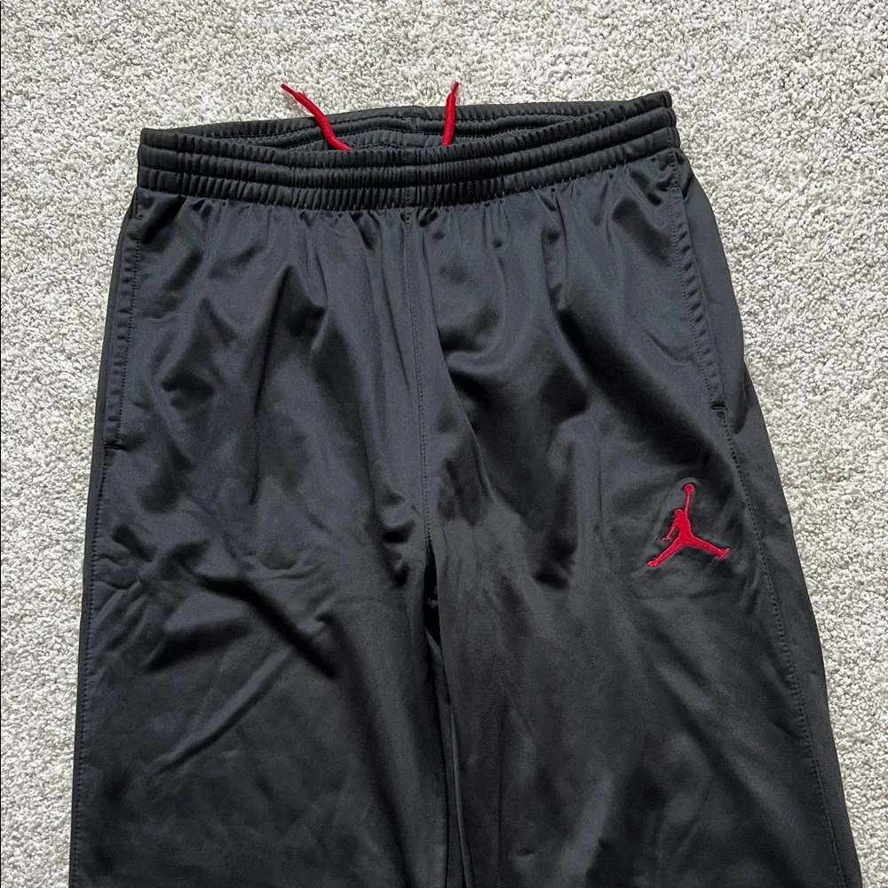 Jordan Kids Black Sweatpants with Red Logo